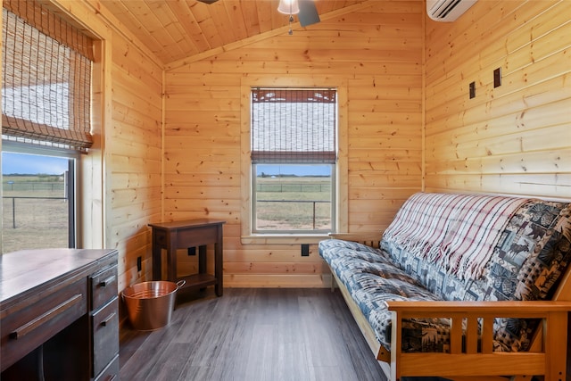 living area with a wall mounted AC, wooden walls, wooden ceiling, dark wood-type flooring, and lofted ceiling