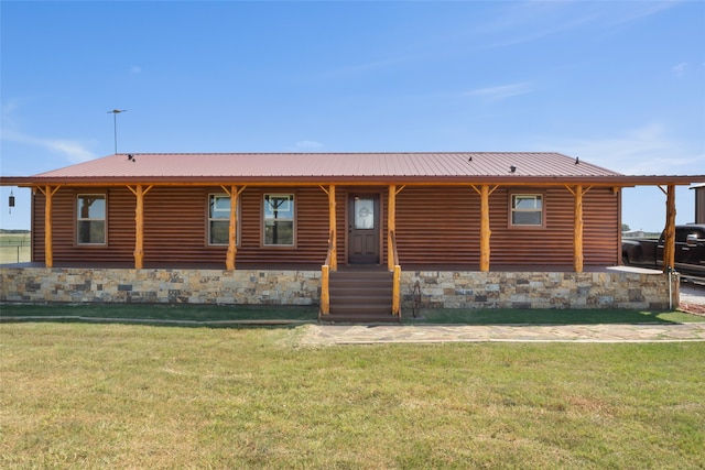 log home featuring a front yard