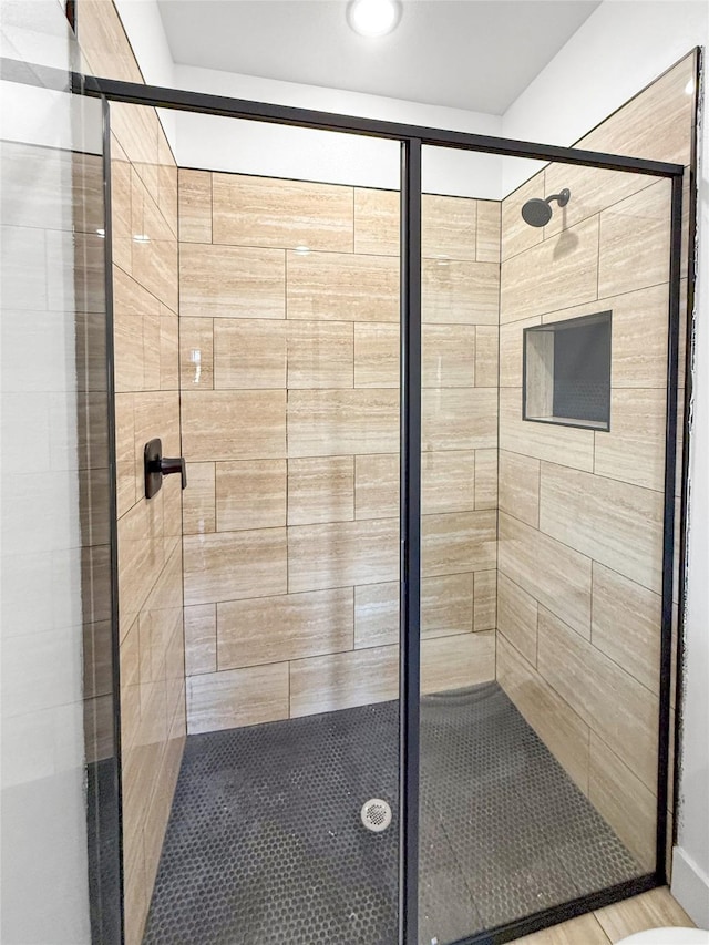 bathroom featuring walk in shower