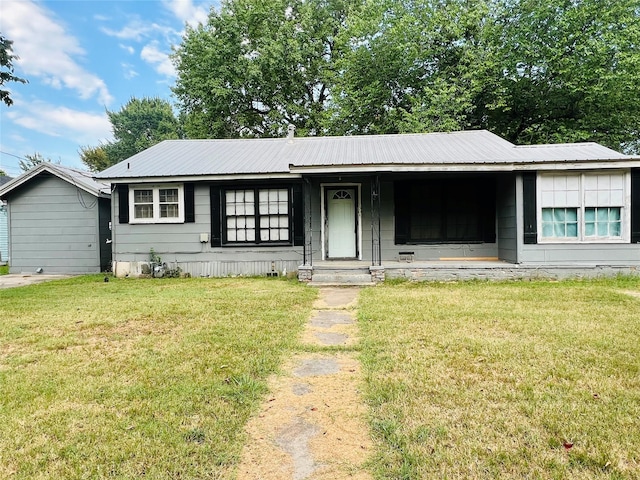 ranch-style house with a front yard