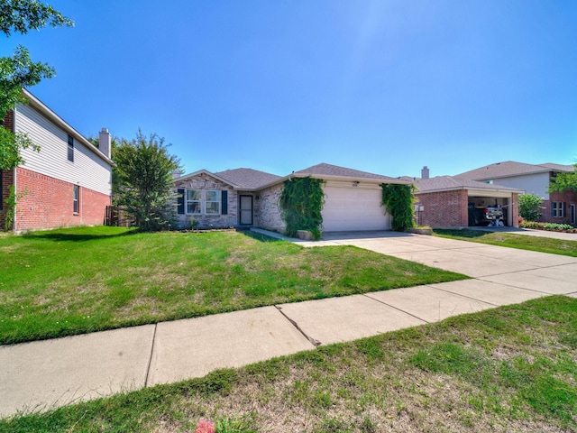 single story home featuring a garage and a front yard