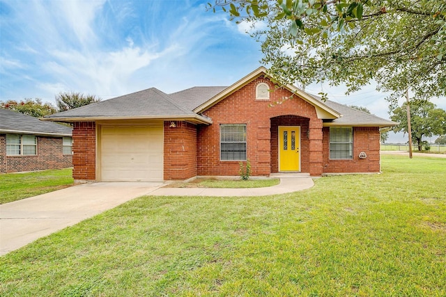 ranch-style home with a garage and a front lawn