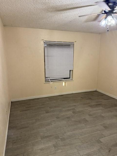 living room featuring a textured ceiling, ceiling fan, and light hardwood / wood-style flooring