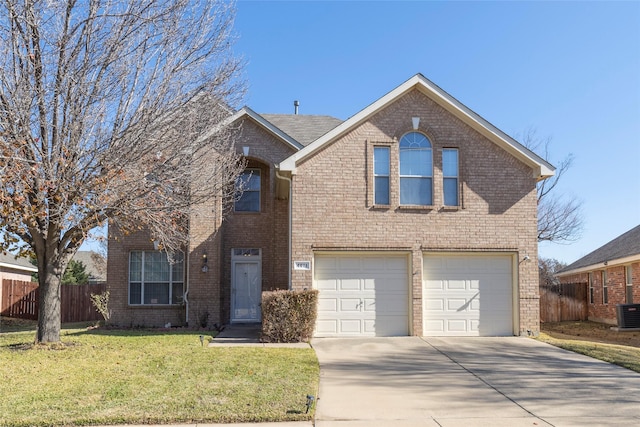 front facade with a front lawn and a garage