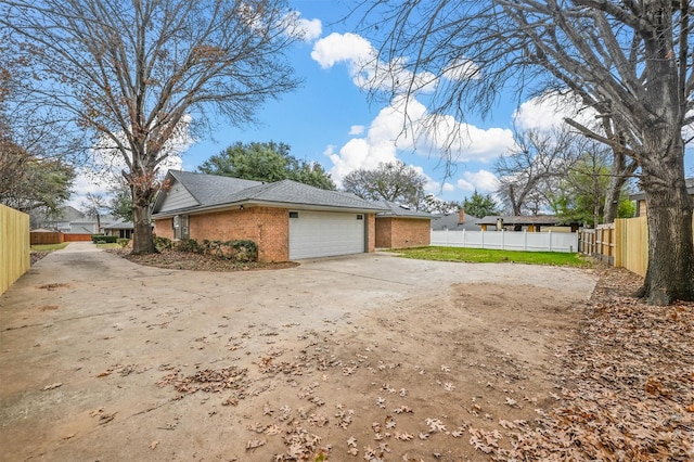 view of property exterior featuring a garage