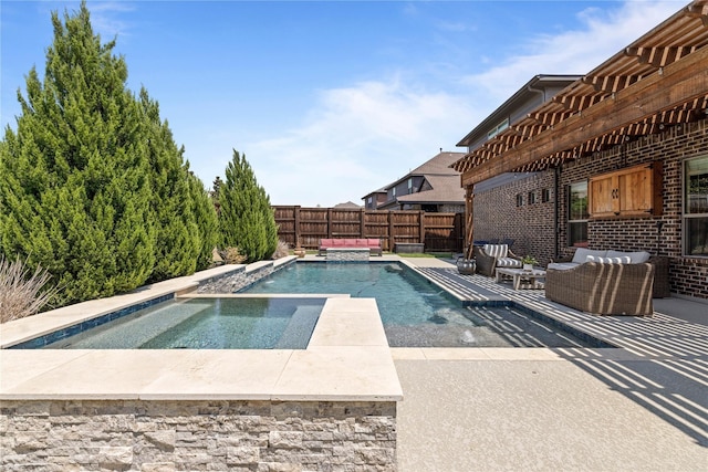 view of swimming pool with outdoor lounge area and a patio