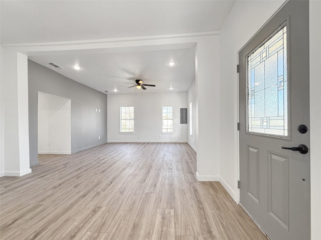 interior space with ceiling fan and light wood-type flooring