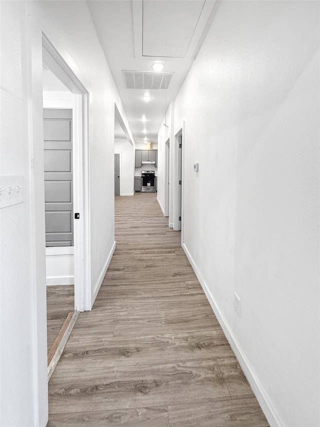 hall featuring light wood-type flooring