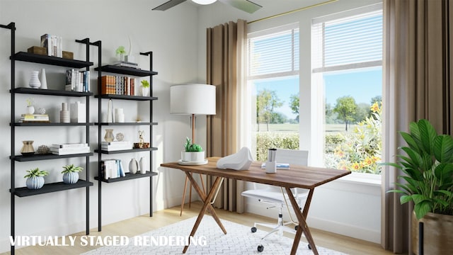 office with ceiling fan, plenty of natural light, and light wood-type flooring