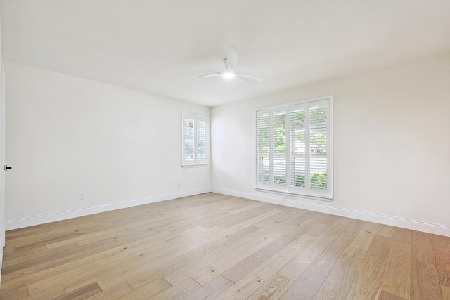 unfurnished room with ceiling fan and light hardwood / wood-style flooring