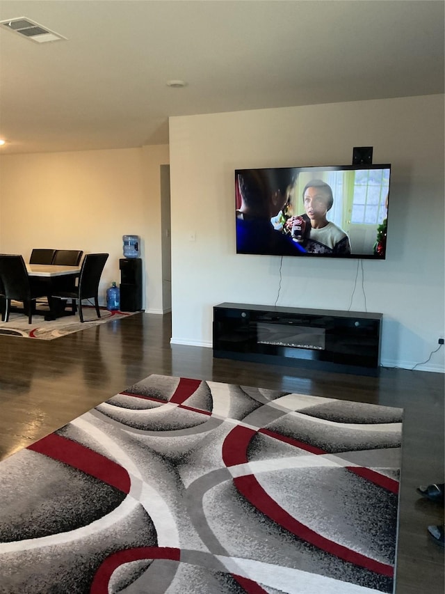 living room featuring wood-type flooring