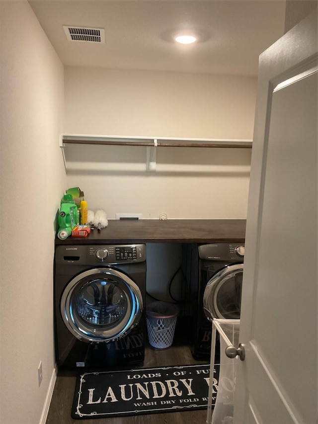 washroom with separate washer and dryer