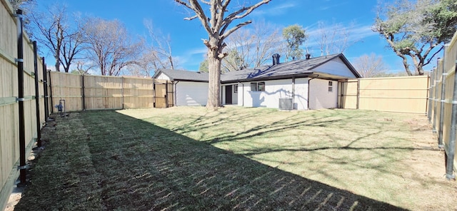 view of yard featuring central AC unit