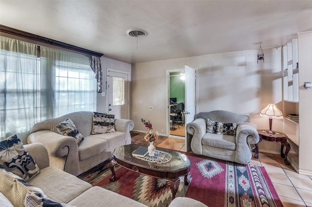 living room featuring light tile patterned floors