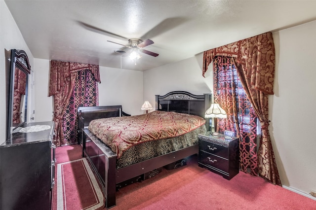 bedroom featuring ceiling fan and carpet floors