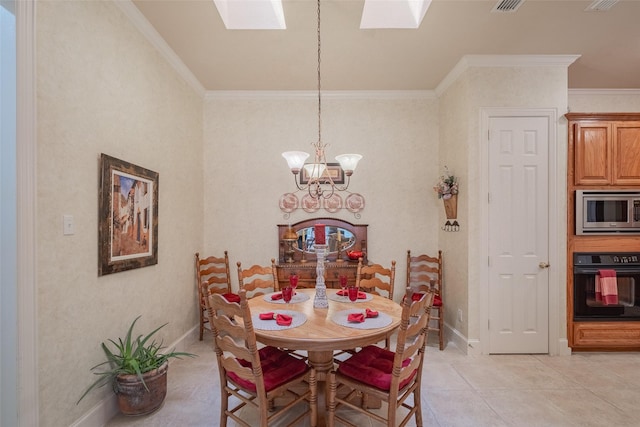 dining area featuring light tile patterned floors, an inviting chandelier, a skylight, and crown molding