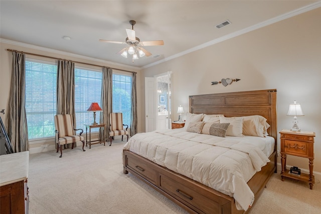 carpeted bedroom featuring ceiling fan and ornamental molding