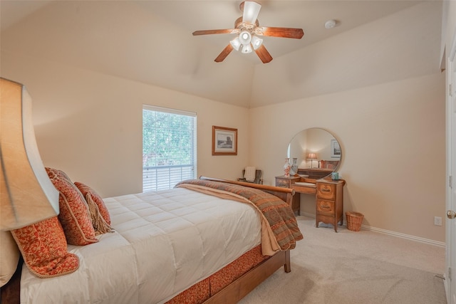 carpeted bedroom featuring ceiling fan and lofted ceiling