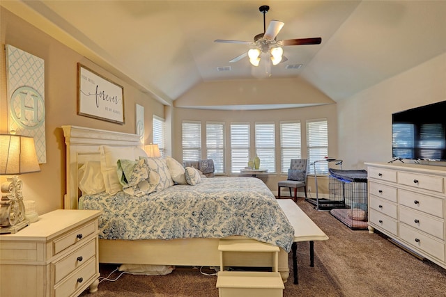 carpeted bedroom featuring vaulted ceiling and ceiling fan