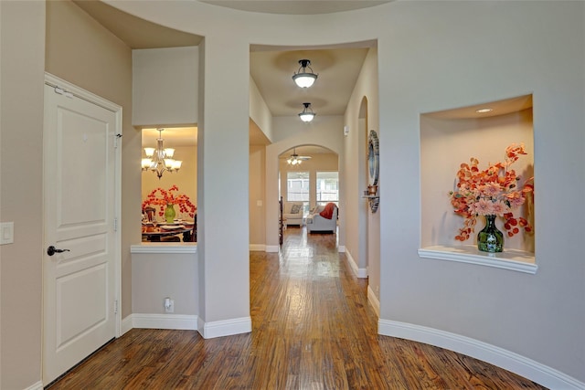 hall featuring dark wood-type flooring