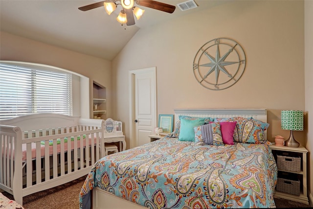 carpeted bedroom featuring ceiling fan and lofted ceiling