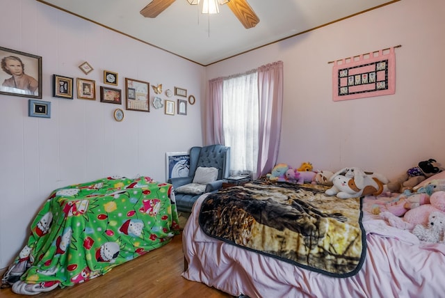 bedroom featuring ceiling fan and wood-type flooring