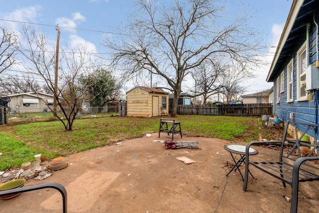 view of patio featuring a storage unit