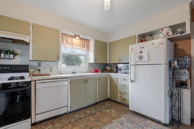 kitchen featuring backsplash, sink, and white appliances