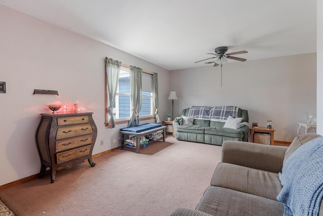 living room with ceiling fan and carpet floors