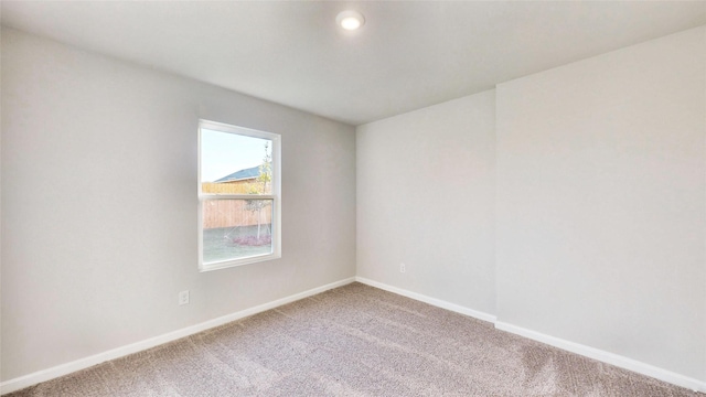 empty room with carpet floors