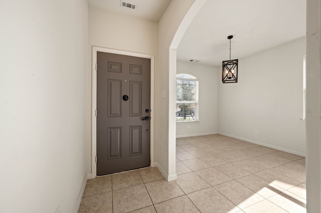 entryway featuring light tile patterned floors