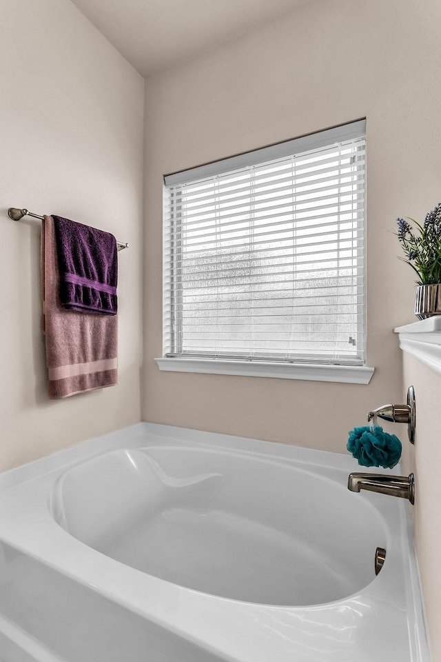 full bathroom featuring a garden tub