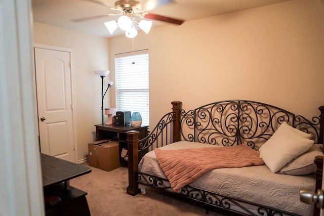 bedroom featuring a ceiling fan and carpet flooring