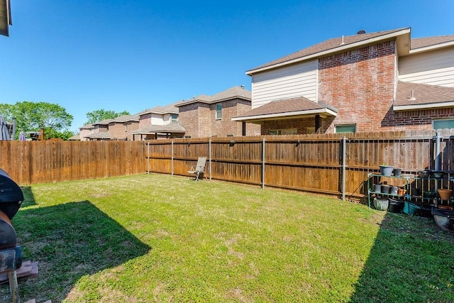 view of yard featuring a residential view