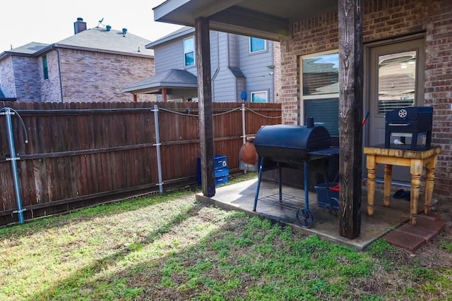 view of yard featuring a patio area and fence