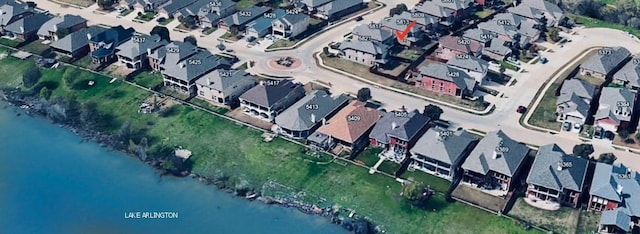 aerial view with a water view and a residential view