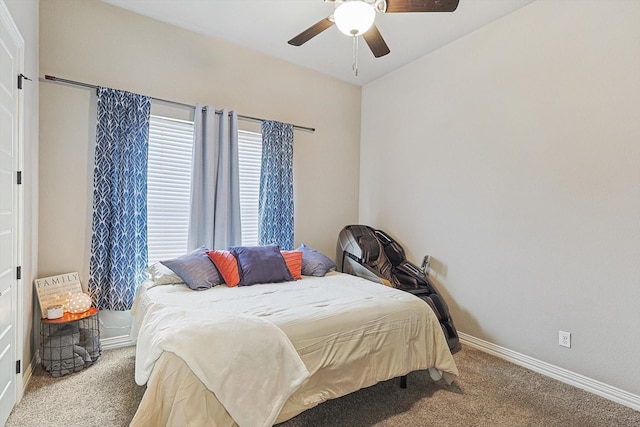 carpeted bedroom featuring ceiling fan