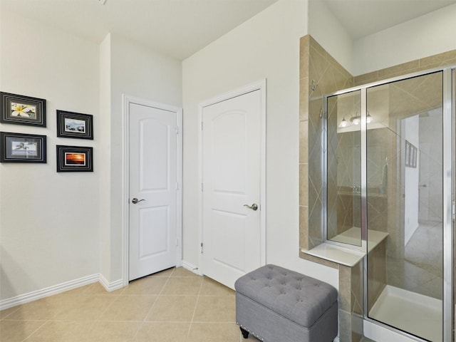 2337 Brookdale Dr, Frisco, TX 75036 - bathroom with a shower stall and tile patterned floors