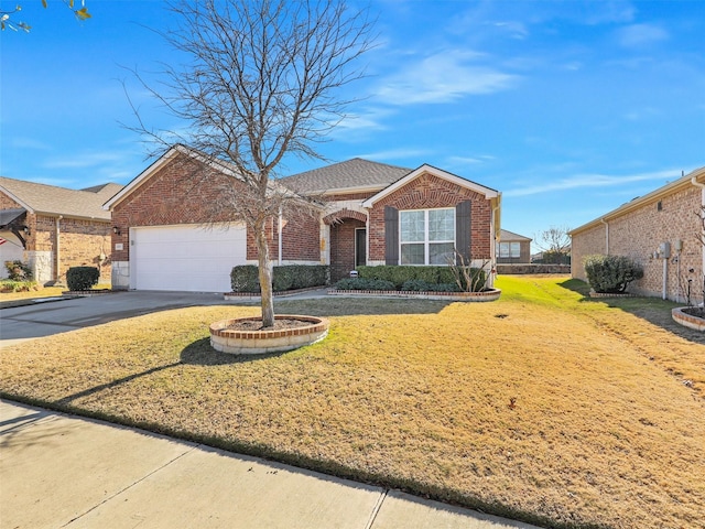 ranch-style home with a garage and a front yard