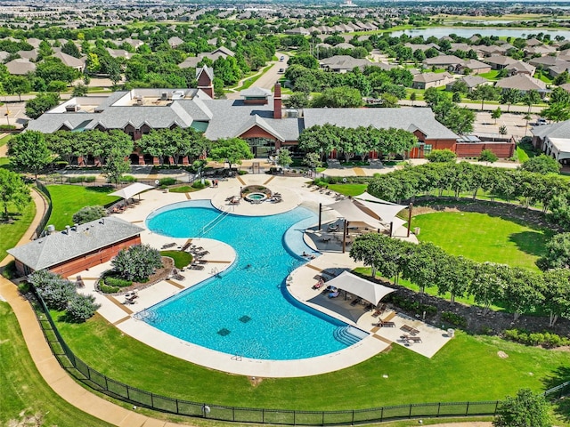 view of pool featuring a water view