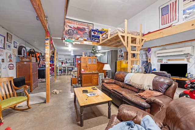 living room with a wall mounted air conditioner and concrete floors