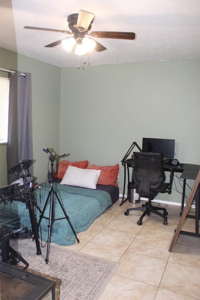 tiled bedroom with ceiling fan