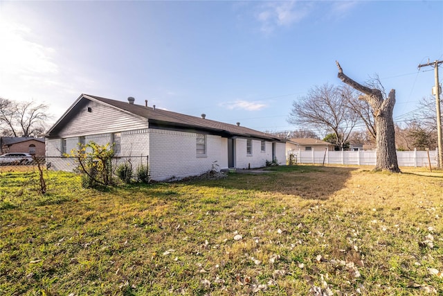 view of property exterior featuring a yard