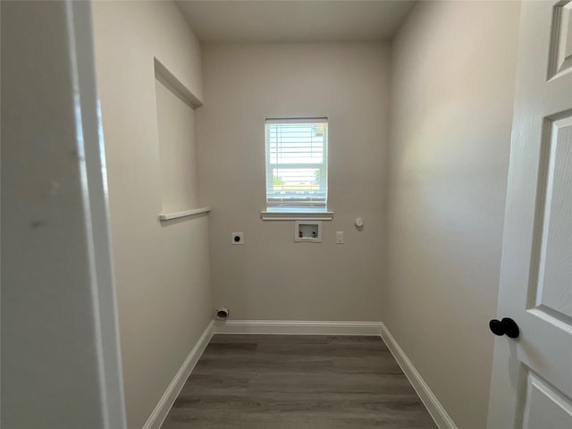 laundry room featuring dark wood-type flooring, washer hookup, and hookup for an electric dryer