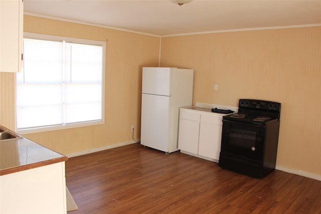 kitchen with white cabinets, dark wood-type flooring, white refrigerator, black electric range oven, and ornamental molding