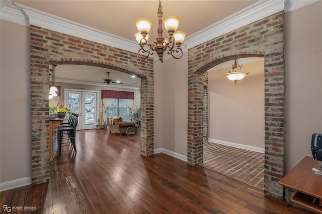 interior space featuring crown molding, french doors, and hardwood / wood-style flooring