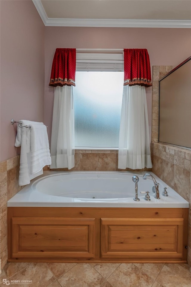 bathroom with crown molding and a tub