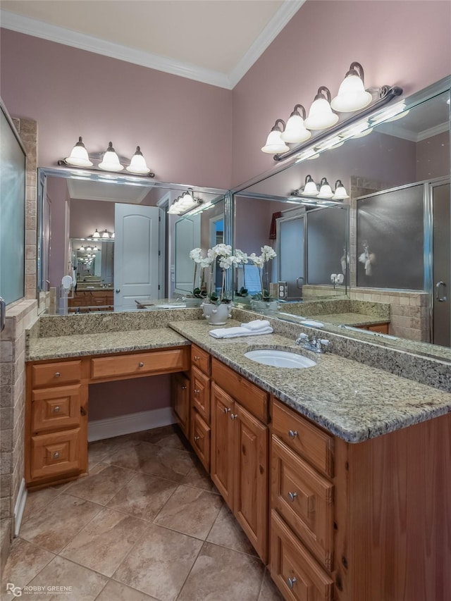 bathroom featuring tile patterned flooring, crown molding, a shower with door, and vanity