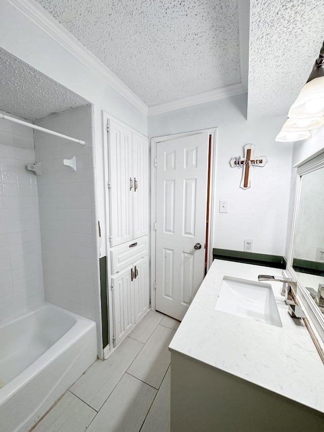 bathroom featuring a textured ceiling, tiled shower / bath combo, tile patterned floors, vanity, and ornamental molding