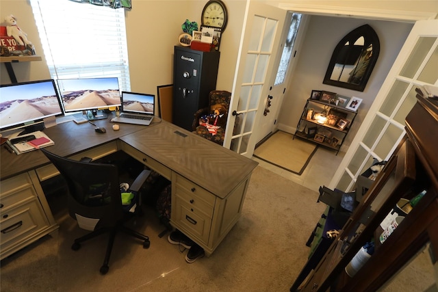 carpeted office space with french doors